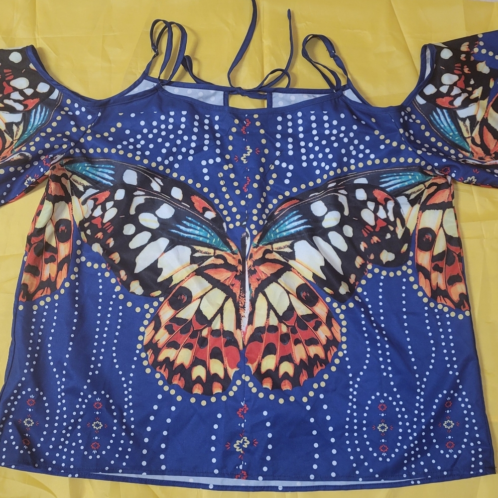 Blouse with peek-a-boo sleeves